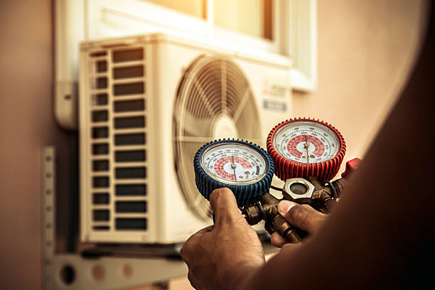 Professional Heat Pump Repair technician working in Sterling, MA